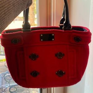 Larger red flannel “jacket pocket” KATE SPADE bag.